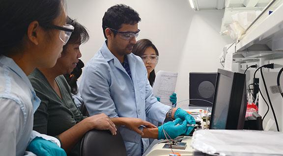 undergraduate students working in a lab