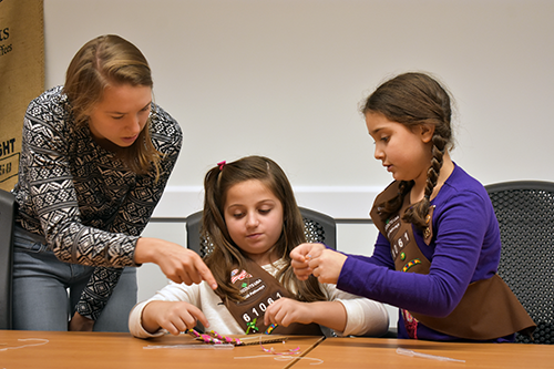 Christine Harper working with kids at Girl Scout Engineering Day in 2018