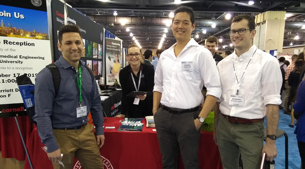 Cornell students at booth at BMES 2019